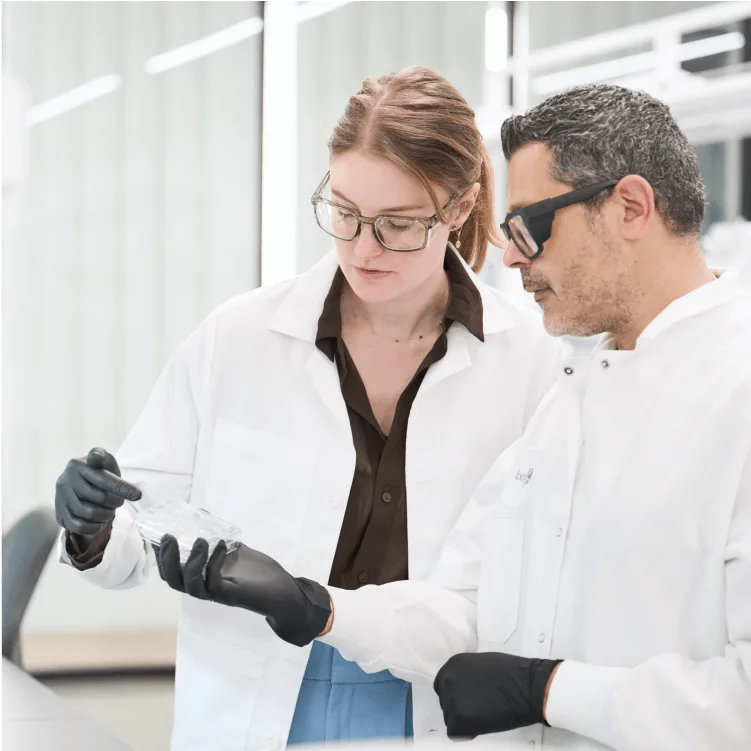 Lab technicians examining samples
