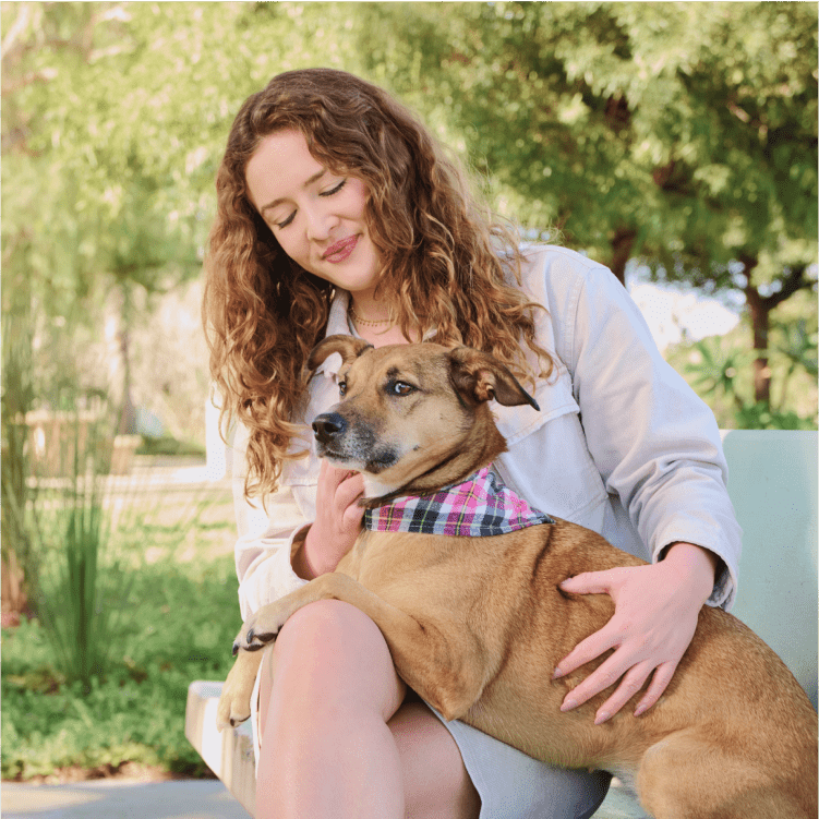 Woman petting a dog