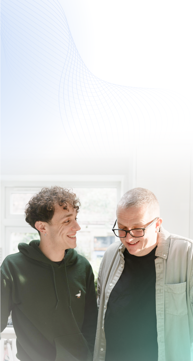 Father and son laughing together